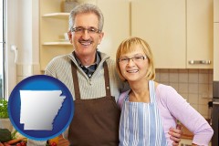 arkansas map icon and a senior couple standing in their apartment kitchen