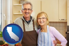 california map icon and a senior couple standing in their apartment kitchen