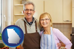 georgia map icon and a senior couple standing in their apartment kitchen