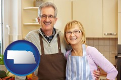 nebraska map icon and a senior couple standing in their apartment kitchen