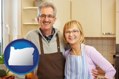 oregon map icon and a senior couple standing in their apartment kitchen