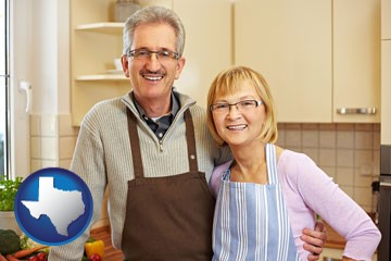 a senior couple standing in their apartment kitchen - with Texas icon