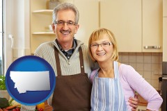 Montana - a senior couple standing in their apartment kitchen